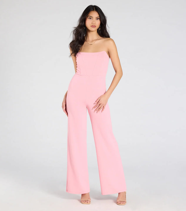 Create bold, fashion-forward looks for spring or summer with the Sultry Babe Strapless Corset Wide-Leg Jumpsuit in pink, a must-have piece from Windsor’s collection of stylish bottoms for women.
