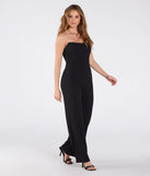Create bold, fashion-forward looks for summer with the Sultry Babe Strapless Corset Wide-Leg Jumpsuit in black, a must-have piece from Windsor’s collection of stylish bottoms for women.