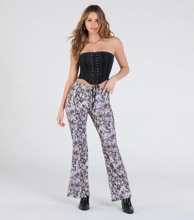 Create bold, fashion-forward looks for spring or summer with the Slithering Impression Snake Print Sequin Flare Pants in snake print, a must-have piece from Windsor’s collection of stylish bottoms for women.