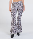 Create bold, fashion-forward looks for spring or summer with the Slithering Impression Snake Print Sequin Flare Pants in snake print, a must-have piece from Windsor’s collection of stylish bottoms for women.