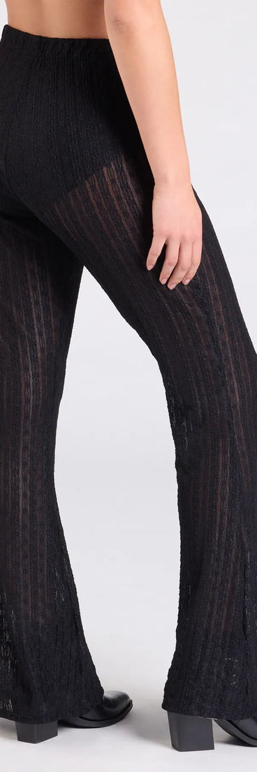 Designed for campus outfits, sleek workwear, and on-the-go moments, the Bohemian Chic Sheer Lace Flare Pants are trendy black bottoms for women bringing effortless fall versatility.