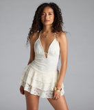 The Boho Dreamer Ruffled Lace Romper in ivory brings edge and energy to your vibe, ready to elevate any festival look or concert outfit.