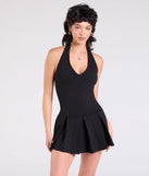 Make a bold statement in the Flirty Flair Halter Pleated Romper in black, the perfect spring dress for weddings, cocktail hours, nights out, and/or seasonal celebrations.