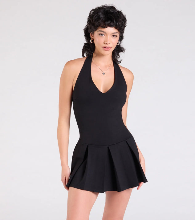 Make a bold statement in the Flirty Flair Halter Pleated Romper in black, the perfect spring dress for weddings, cocktail hours, nights out, and/or seasonal celebrations.