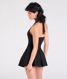 Make a bold statement in the Flirty Flair Halter Pleated Romper in black, the perfect spring dress for weddings, cocktail hours, nights out, and/or seasonal celebrations.