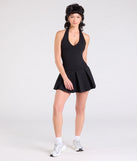 The Flirty Flair Halter Pleated Romper in black brings edge and energy to your vibe, ready to elevate any festival look or concert outfit.