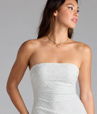 The Daytime Fit' Strapless Eyelet Romper in ivory brings sleek style to any graduation outfit, from cap and gown to after-party.
