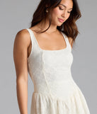 The Gorgeous Energy Lace Skort Bubble Romper in ivory brings sleek style to any graduation outfit, from cap and gown to after-party.