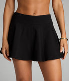 Designed for campus outfits, sleek workwear, and on-the-go moments, the Twirl With It High Rise Pleated Skort is a trendy black bottom for women bringing effortless fall versatility.
