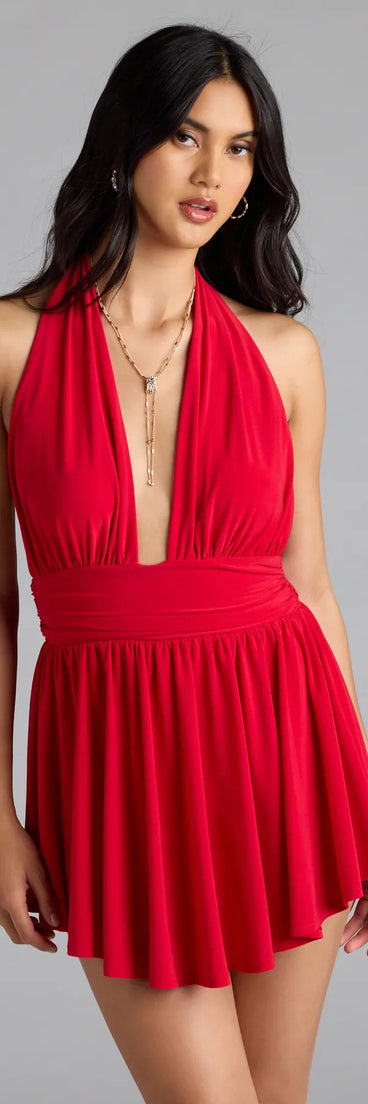With its easy fit and flirty cut, the Bold Babe Halter Plunge Neck Romper is a red one-piece that brings fun, freedom, and movement to your weekend look.