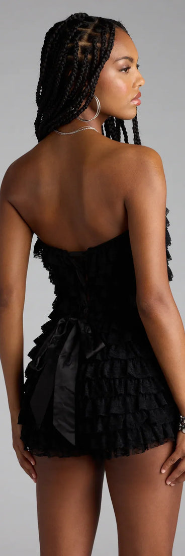 Designed for campus outfits, sleek workwear, and on-the-go moments, the For The Frill Of It Lace-Up Ruffled Romper is a trendy black bottom for women bringing effortless fall versatility.