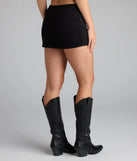 Designed for campus outfits, sleek workwear, and on-the-go moments, the Buckle Up Babe Belted Wrap Skort is a trendy black bottom for women bringing effortless fall versatility.