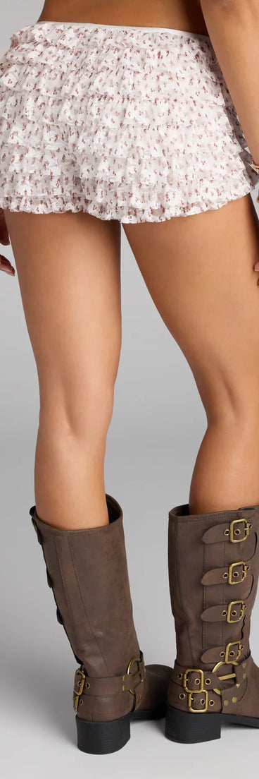 Style up your rotation with the Laced and Floral Ruffled Shorts, trendy ivory shorts made to anchor every outfit with attitude and ease.