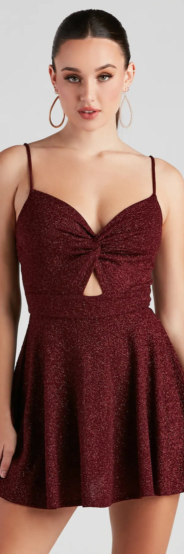Step into winter chic with the Twisted Style Glitter Skater Romper, a burgundy mini romper dress featuring an above-the-knee cut ideal for cocktail parties, festive gatherings, or clubwear.