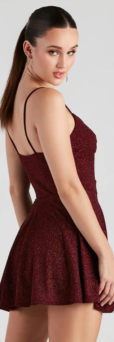 Twisted Style Glitter Skater Romper in burgundy , a stylish red dress with a flattering fit and fabric that adds allure to your look, perfect for wedding guest attire, cocktail events, or making a bold statement on a date night.