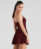 Twisted Style Glitter Skater Romper in burgundy , a stylish red dress with a flattering fit and fabric that adds allure to your look, perfect for wedding guest attire, cocktail events, or making a bold statement on a date night.