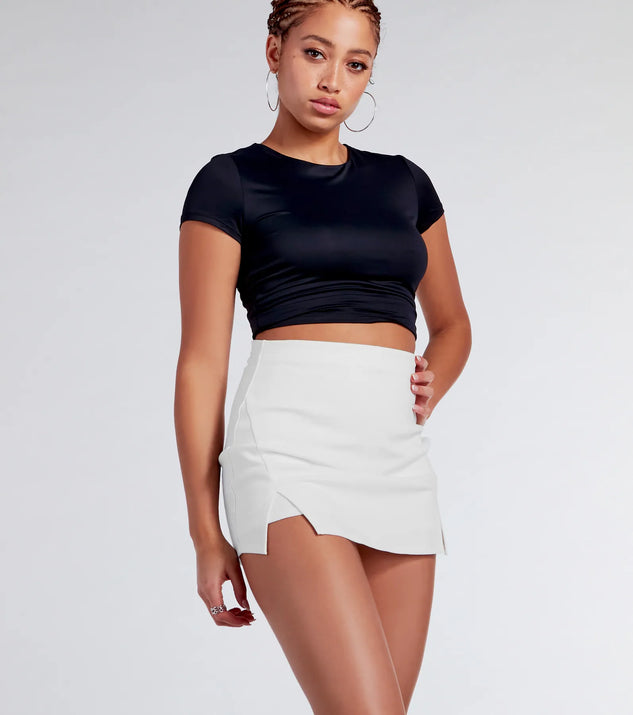 Create bold, fashion-forward looks for spring or summer with the Cute Attitude Ponte Slit Mini Skort in ivory, a must-have piece from Windsor’s collection of stylish bottoms for women.
