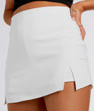 Create bold, fashion-forward looks for spring or summer with the Cute Attitude Ponte Slit Mini Skort in ivory, a must-have piece from Windsor’s collection of stylish bottoms for women.