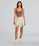 Create bold, fashion-forward looks for spring or summer with the Sweetest Vibe Hanky Hem Lace Mini Skort in ivory, a must-have piece from Windsor’s collection of stylish bottoms for women.