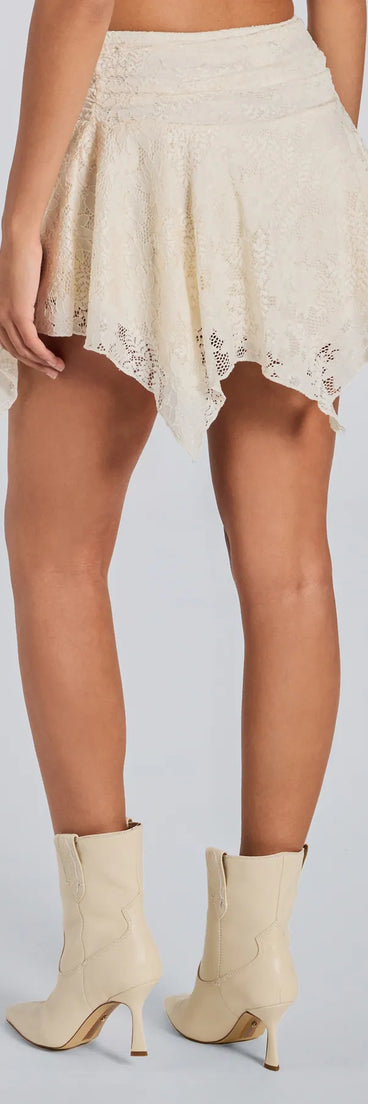 The Sweetest Vibe Hanky Hem Lace Mini Skort in ivory brings sleek style to any graduation outfit, from cap and gown to after-party.