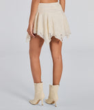 The Sweetest Vibe Hanky Hem Lace Mini Skort in ivory brings sleek style to any graduation outfit, from cap and gown to after-party.