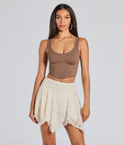 Create bold, fashion-forward looks for spring or summer with the Sweetest Vibe Hanky Hem Lace Mini Skort in ivory, a must-have piece from Windsor’s collection of stylish bottoms for women.