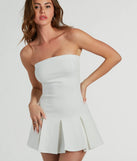 Perfect as a dress alternative for a date-night outfit, wedding guest attire, and cocktail party dress alike, the All The Likes Strapless Pleated Ponte Romper is a women's ivory romper that combines a stylish, unique design with festive colors and on-trend details for a standout look!
