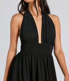 Create bold, fashion-forward looks for spring or summer with the 50s Icon Halter Plunge Neck Skater Romper in black, a must-have piece from Windsor’s collection of stylish bottoms for women.