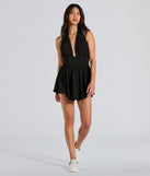 Create bold, fashion-forward looks for spring or summer with the 50s Icon Halter Plunge Neck Skater Romper in black, a must-have piece from Windsor’s collection of stylish bottoms for women.
