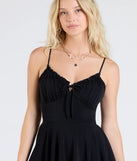 Create bold, fashion-forward looks for spring or summer with the One Take V-Neck Ruffle Skater Romper in black, a must-have piece from Windsor’s collection of stylish bottoms for women.