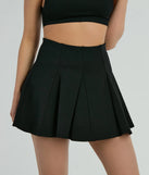 The Flirty Attitude Pleated Knit Skater Skort is a trendy women's bottom in black, designed with modern details and alluring textures to complete chic outfits for 2025.