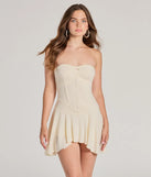 Create bold, fashion-forward looks for spring or summer with the Sweet Allure Strapless Drop Waist Skater Romper in natural, a must-have piece from Windsor’s collection of stylish bottoms for women.