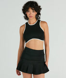 The Sensational Sight High-Rise Ruffle Mini Skort is a trendy women's bottom in black, designed with modern details and alluring textures to complete chic outfits for 2025.