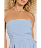 Revamp your 2025 wardrobe with this chic addition, the Always Shimmering Strapless Glitter Ruffle Romper in light blue, perfect for elevating your style in the new year.