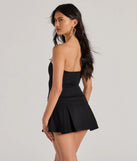 Perfect as a dress alternative for a date-night outfit, wedding guest attire, and cocktail party dress alike, the Cute Charm Strapless Ruffled Bow-Front Skater Romper is a women's black romper that combines a stylish, unique design with festive colors and on-trend details for a standout look!