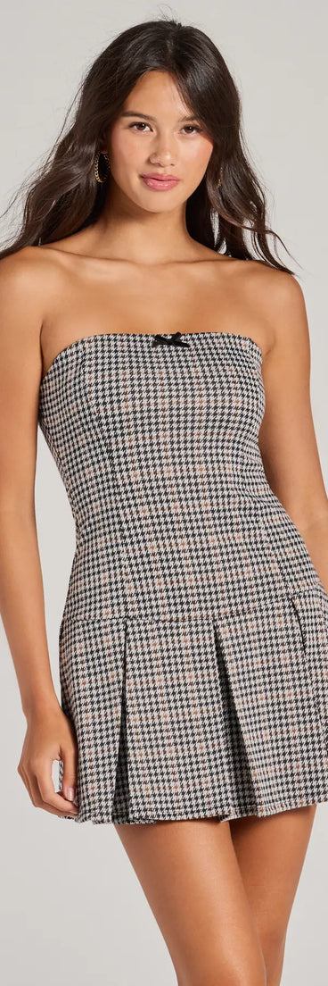 Perfect as a dress alternative for a date-night outfit, wedding guest attire, and cocktail party dress alike, the Sweet Perception Strapless Plaid Pleated Romper is a women's gray romper that combines a stylish, unique design with festive colors and on-trend details for a standout look!