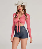 Perfect as a dress alternative for a New Year's outfit, wedding guest attire, and cocktail party dress alike, the Rodeo Cowgirl Gingham Tie-Front Romper is a women's red romper that combines a stylish, unique design with festive colors and holiday-ready details for a standout look!
