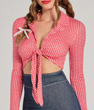 Perfect as a dress alternative for a New Year's outfit, wedding guest attire, and cocktail party dress alike, the Rodeo Cowgirl Gingham Tie-Front Romper is a women's red romper that combines a stylish, unique design with festive colors and holiday-ready details for a standout look!