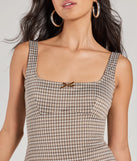 The Charming Direction Sleeveless Plaid Romper is a trendy women's bottom in taupe, designed with modern details and alluring textures to complete chic outfits for 2025.