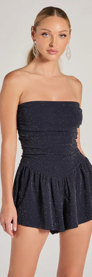 Perfect as a dress alternative for a New Year's outfit, wedding guest attire, and cocktail party dress alike, the Sparkly Mood Glitter Drop Waist Skater Romper is a women's navy romper that combines a stylish, unique design with festive colors and holiday-ready details for a standout look!