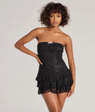 Perfect as a dress alternative for a date-night outfit, wedding guest attire, and cocktail party dress alike, the Simply Adorable Ruffled Drop Waist Lace Romper is a women's black romper that combines a stylish, unique design with festive colors and on-trend details for a standout look!