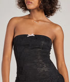 Perfect as a dress alternative for a date-night outfit, wedding guest attire, and cocktail party dress alike, the Simply Adorable Ruffled Drop Waist Lace Romper is a women's black romper that combines a stylish, unique design with festive colors and on-trend details for a standout look!