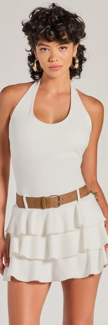 Perfect as a dress alternative for a date-night outfit, wedding guest attire, and cocktail party dress alike, the Trendy Slay Ruffled Drop Waist Romper is a women's ivory romper that combines a stylish, unique design with festive colors and on-trend details for a standout look!