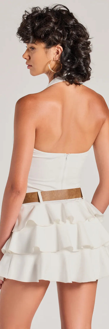 The Trendy Slay Ruffled Drop Waist Romper is a trendy women's bottom in ivory, designed with modern details and alluring textures to complete chic outfits for 2025.
