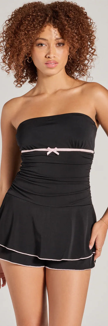 With its easy fit and flirty cut, the Little Crush Sleeveless Bow Pleated Romper is a black one-piece that brings fun, freedom, and movement to your weekend look.