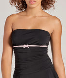 Revamp your 2025 wardrobe with this chic addition, the Little Crush Sleeveless Bow Pleated Romper in black, perfect for elevating your style in the new year.