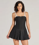 Perfect as a dress alternative for a date-night outfit, wedding guest attire, and cocktail party dress alike, the Chicest Look Pinstripe Pleated Drop Waist Romper is a women's black romper that combines a stylish, unique design with festive colors and on-trend details for a standout look!