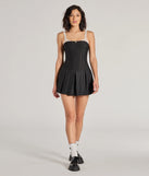 Create bold, fashion-forward looks for spring or summer with the Chicest Look Pinstripe Pleated Drop Waist Romper in black, a must-have piece from Windsor’s collection of stylish bottoms for women.