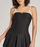 Perfect as a dress alternative for a date-night outfit, wedding guest attire, and cocktail party dress alike, the Chicest Look Pinstripe Pleated Drop Waist Romper is a women's black romper that combines a stylish, unique design with festive colors and on-trend details for a standout look!