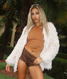 Create bold, fashion-forward looks for spring or summer with the Sassy Chic Leopard Print Faux Suede Hot Shorts in brown, a must-have piece from Windsor’s collection of stylish bottoms for women.